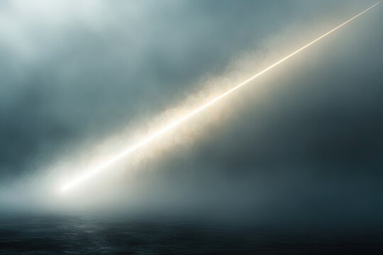 dramatic shot of beam of light slicing through foggy air symbolizing finding clarity in complex situations