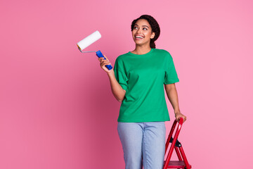 Photo portrait of lovely young lady look empty space paint wall dressed stylish green garment...