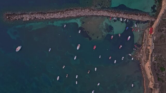 Aerial view of methoni castle by the tranquil mediterranean sea at sunrise, methoni, greece.