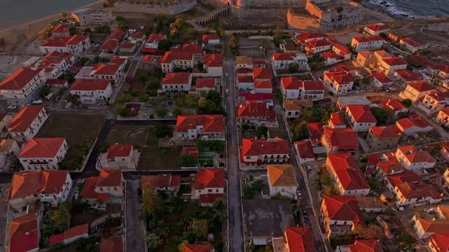 Aerial view of Methoni Castle and the beautiful coastline at sunrise, Methoni, Greece.