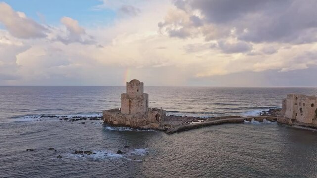 Aerial view of Methoni Castle by the Mediterranean Sea at sunrise, Methoni, Greece.