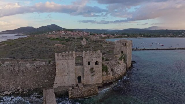 Aerial view of methoni castle at sunrise overlooking the mediterranean sea, methoni, greece.