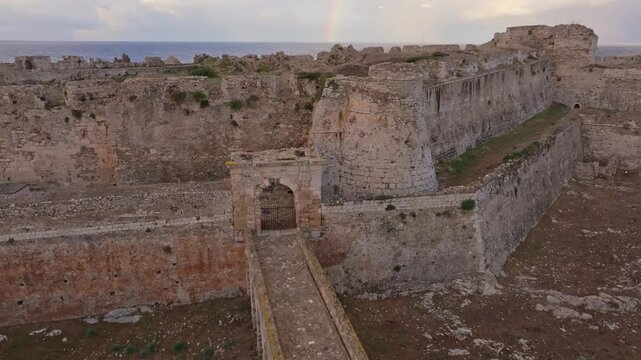 Aerial view of methoni castle at sunrise by the mediterranean sea, methoni, greece.