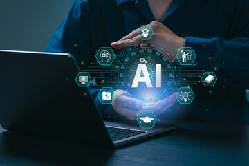 AI Artificial Intelligence and Education technology concept. A man use laptops, Learn lessons and...