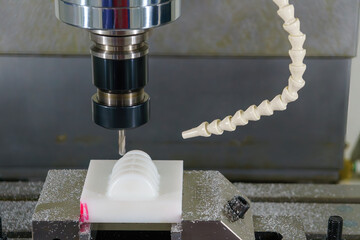 The nylon material parts cutting the by CNC milling machine with solid ball nose end mill tool.