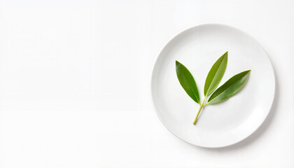 Fresh green leaves on a white plate, Peace Day
