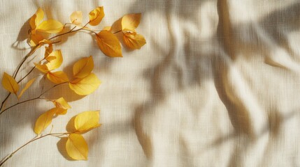 Fototapeta premium Autumnal Leaves on Beige Linen Fabric Background.
