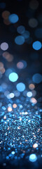Fototapeta premium Blue glitter with blurred and bokeh background, shimmering particles in a soft focus gradient.