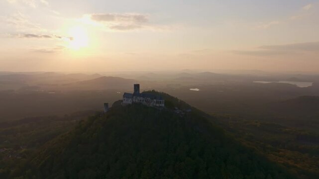 Aerial view of Bezdez Castle at sunset with a picturesque landscape, Bezdez, Czech Republic.