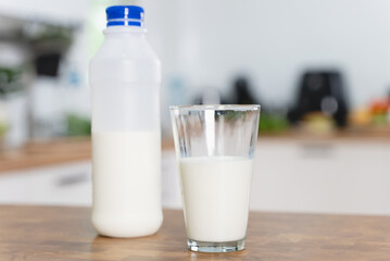 Close up a glass of milk on the table