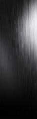 Obraz premium Brushed graphite gray metal texture. Dark metallic surface with sleek streaks.