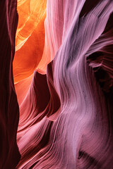Lower Antelope Canyon near Page Arizona. The canyon is famous for its stunning wave-like sandstone walls that come alive with vibrant colors when sunlight filters through the cracks