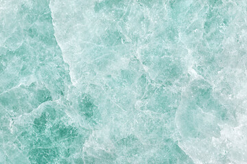 Fototapeta premium serene light turquoise background with soft texture, resembling ice or crystal formations, creates calming atmosphere. Perfect for various design projects