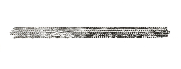 black traces of tractor tires on white background..