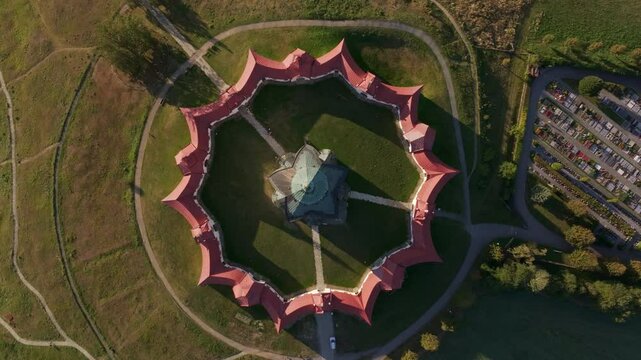 Aerial view of the beautiful Pilgrimage Church of Saint John of Nepomuk surrounded by a scenic garden and historic landscape, Zdar nad Sazavou, Czech Republic.