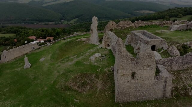 Aerial view of the ruins of Branc castle on a hilltop surrounded by beautiful countryside, Podzamok, Slovakia.