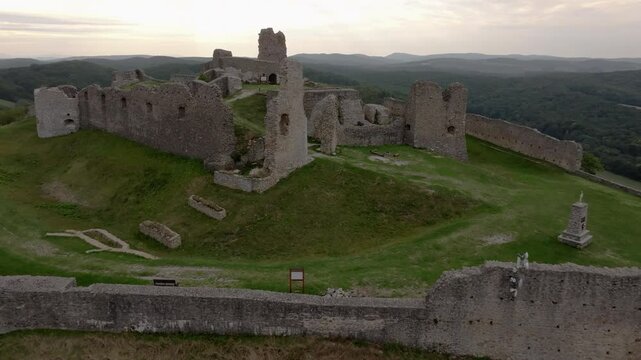 Aerial view of the historic Branc castle ruins on a hilltop surrounded by scenic countryside, Podzamok, Slovakia.