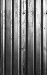 Obraz premium Corrugated steel texture. Durable metallic surface with alternating ridges and grooves.