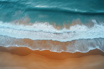 beautiful aerial view of pristine sandy beach with rolling ocean waves creating natural patterns perfect summer holiday destination background