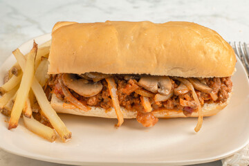 sloppy joe sub with  mushrooms and onions