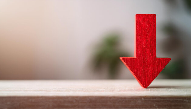 Red wooden arrow pointing down. Business collapse, regression, decline.