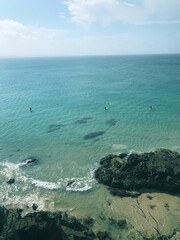 surfers in byron bay