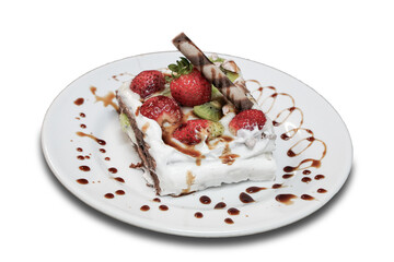 A slice of strawberry avocado cake portioned on a plate, decorated with chocolate and white cream, homemade cake, white background