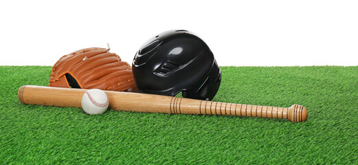 Baseball bat, ball, helmet and glove on green grass against white background. Sport equipment