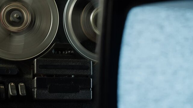 Tape audio music player with tv television, studio magnetic tape with pc computer data stogare, vintage retro spool reel to reel player and recorder, magnetic tape data storage close up, music studio