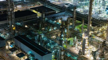 Illuminated Industrial Refinery at Night