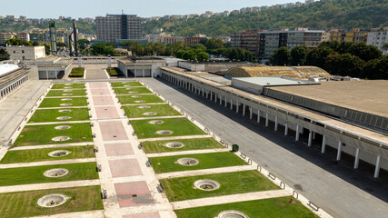 Aerial view of Colombo square and the entrance of the Mostra d'Oltremare in Naples, one of the primary exhibition complex in Italy. The exhibition building is located in the district of Fuorigrotta.
