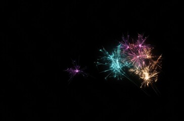 Fototapeta premium A black background with a colorful display of fireworks