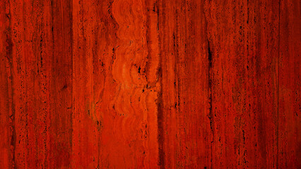 Naklejka premium abstract textured travertine stone wall with a red background, ideal for creating a classic and elegant ambiance in design projects, background for timeless, sophisticated aesthetic concept.