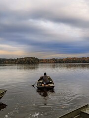 Jon boat on North Carolina lake with autumn trees
