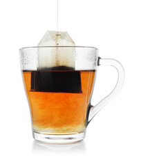 Cup with teabag isolated on white. Brewing aromatic tea