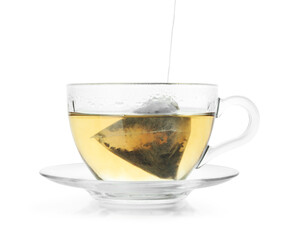 Cup with tea bag isolated on white