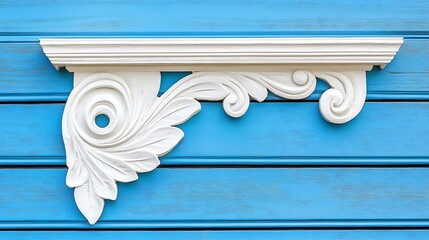 White Ornate Corbel Against Blue Wooden Background
