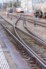 High angle view of railroad track and railroad switch at Swiss railway station of Glattbrugg on a winter day. Photo taken July 9th, 2025, Glattbrugg, Switzerland.