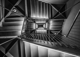 View of beautiful black and white spiral staircase in modern architecture, Tokyo, Japan.