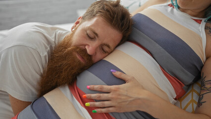 Man listening to pregnant woman's belly, showing love and connection in a cozy bedroom setting, emphasizing family bond and anticipation of the baby.