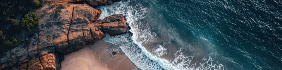 Coastal Cliffs and Azure Waves: An aerial view captures the dramatic meeting of rugged, red coastal...