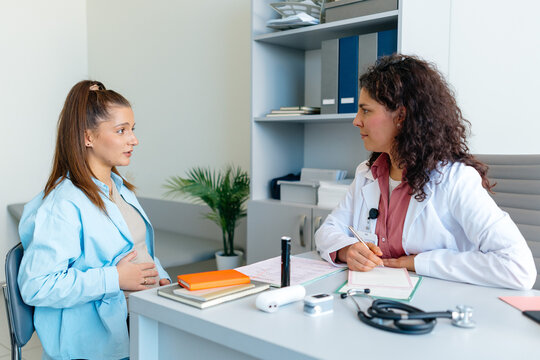 A pregnant woman at a clinic appointment