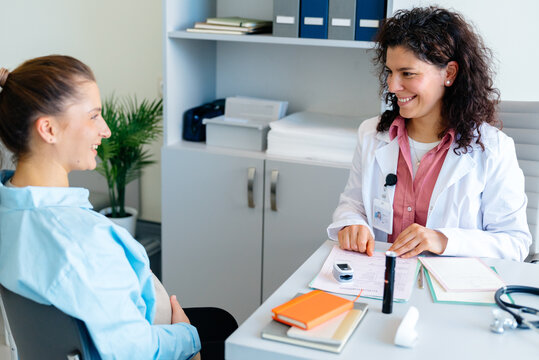 A pregnant woman at a clinic appointment