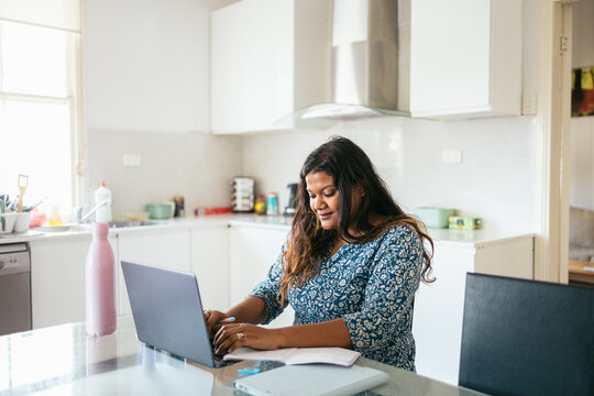 Student doing her assignments from home