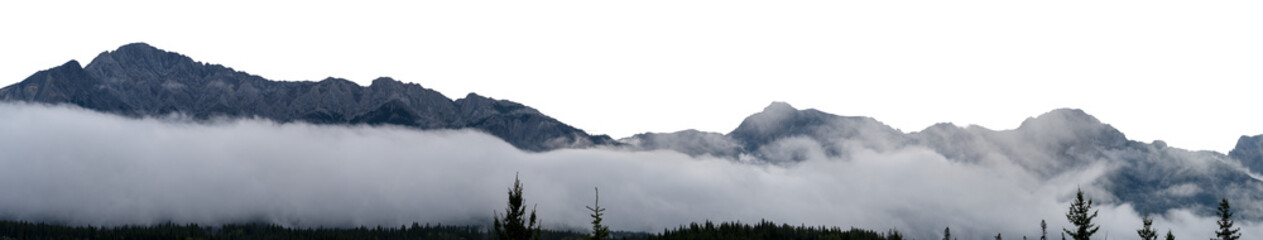 Panorama of mountain range with transparent sky and trees along the horizon
