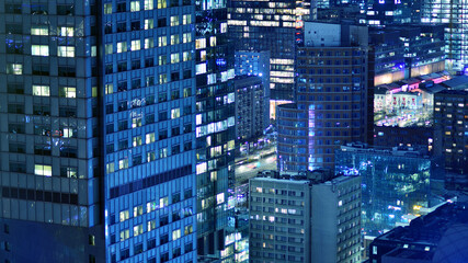 Aerial photography of modern architectural landscapes at night. Lights in the windows of buildings....