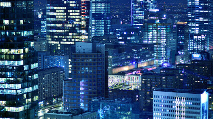 Aerial photography of modern architectural landscapes at night. Lights in the windows of buildings....