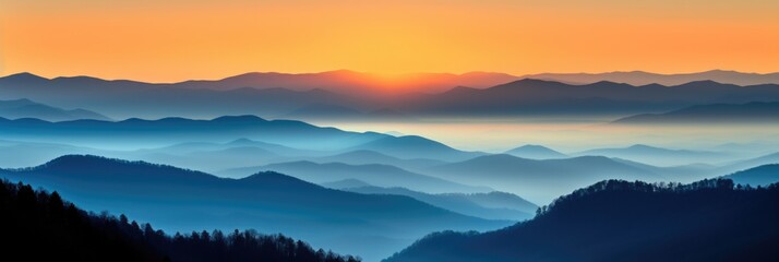 Obraz premium Early Smoky Mountain Sunset with Orange Ridge and Blue Country Sky