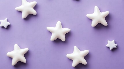 White star shapes arranged on a purple background