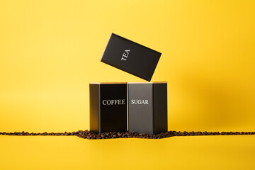 three containers with the words on a yellow background